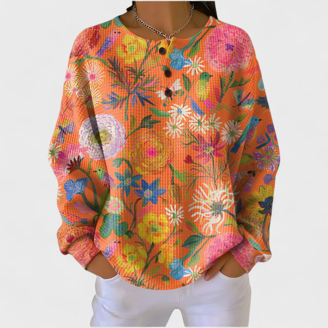 Felizitas | Oranger Pullover mit buntem Blumenmuster